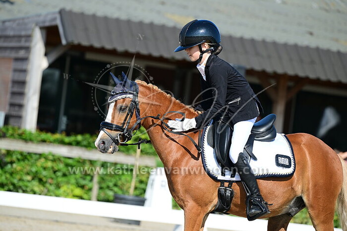 Kelsey van den Berg - Armani